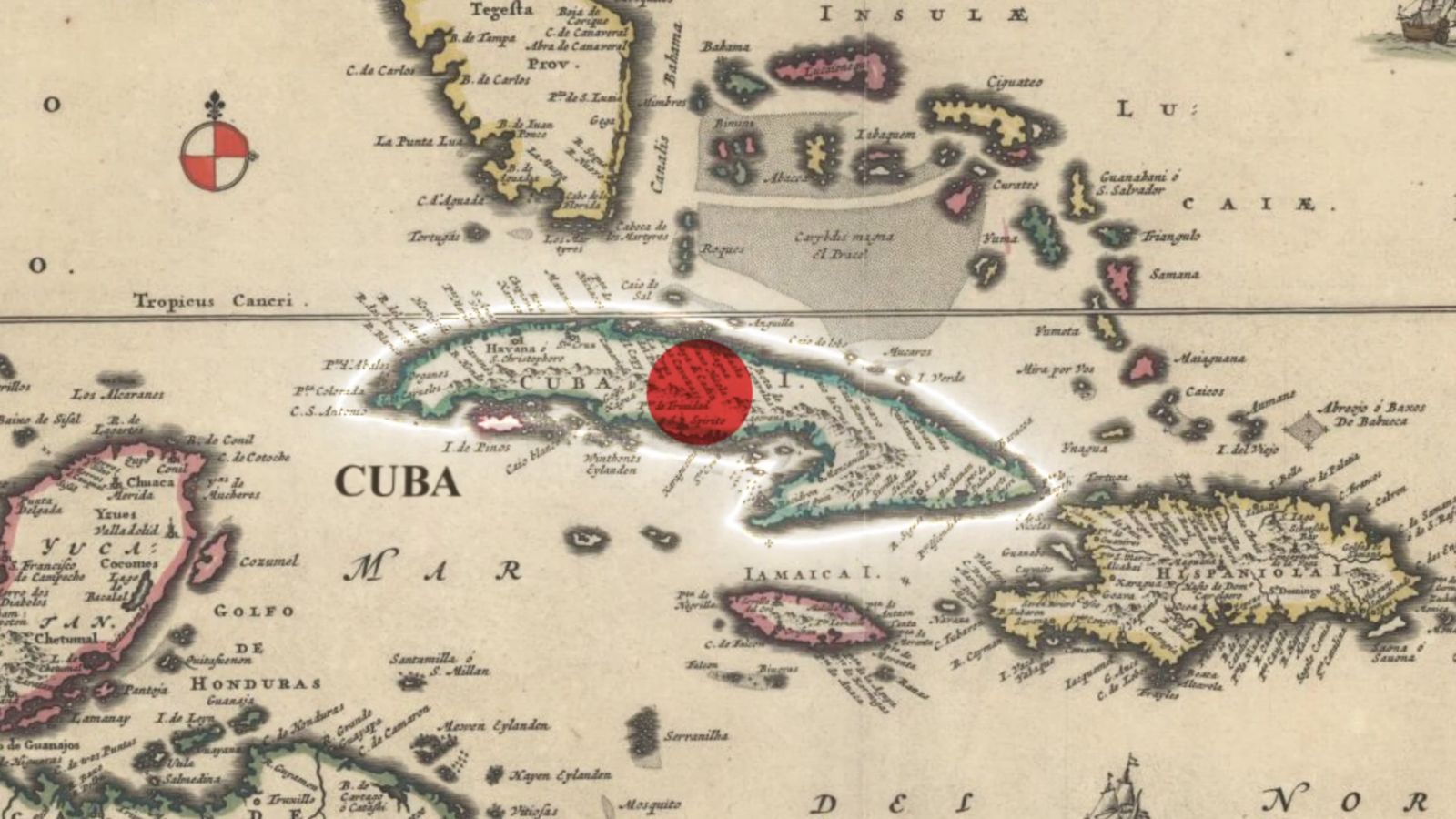 an old map of cuba with a red dot