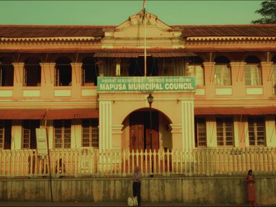 a large building with a flag on top of it