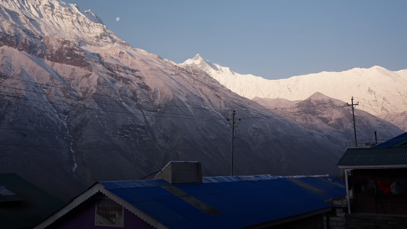 a view of a snow covered mountain range