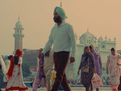 a group of people walking down a street