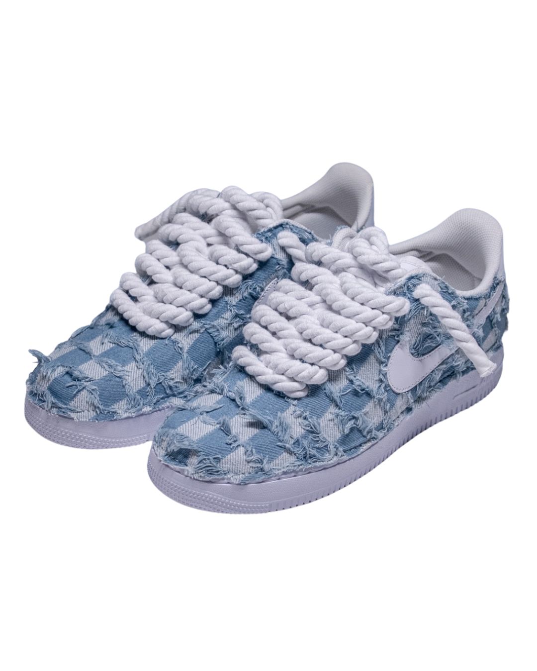 a blue and white sneaker with white laces