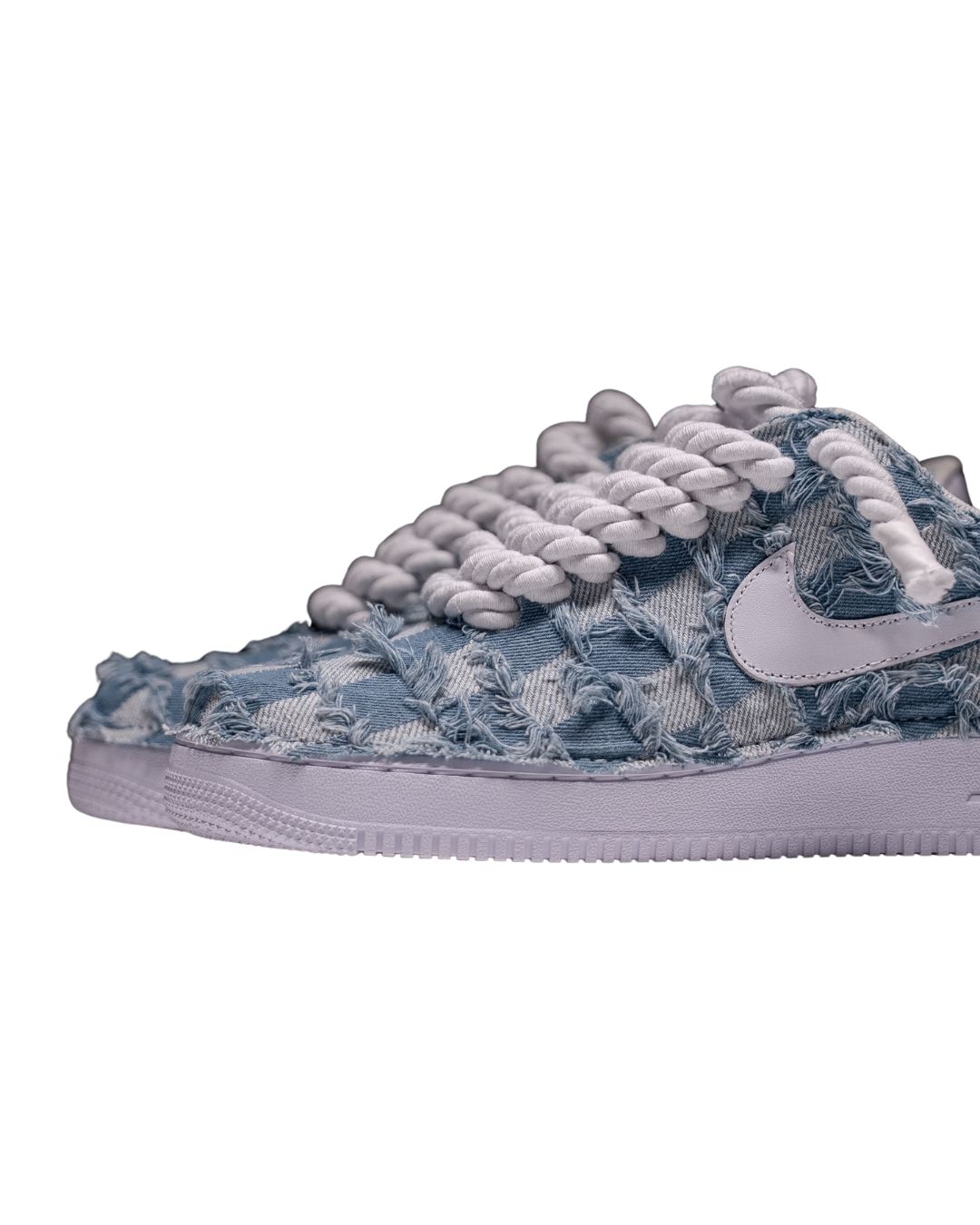 a blue and white nike air force sneakers