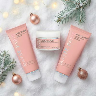 a couple of tubes of cream sitting on top of a snow covered ground