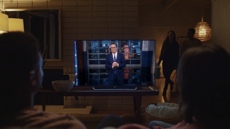 a group of people watching a television show