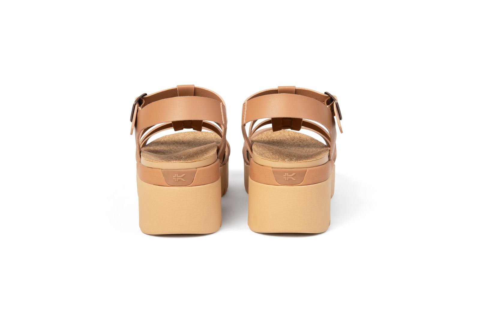 a pair of women's sandals on a white background