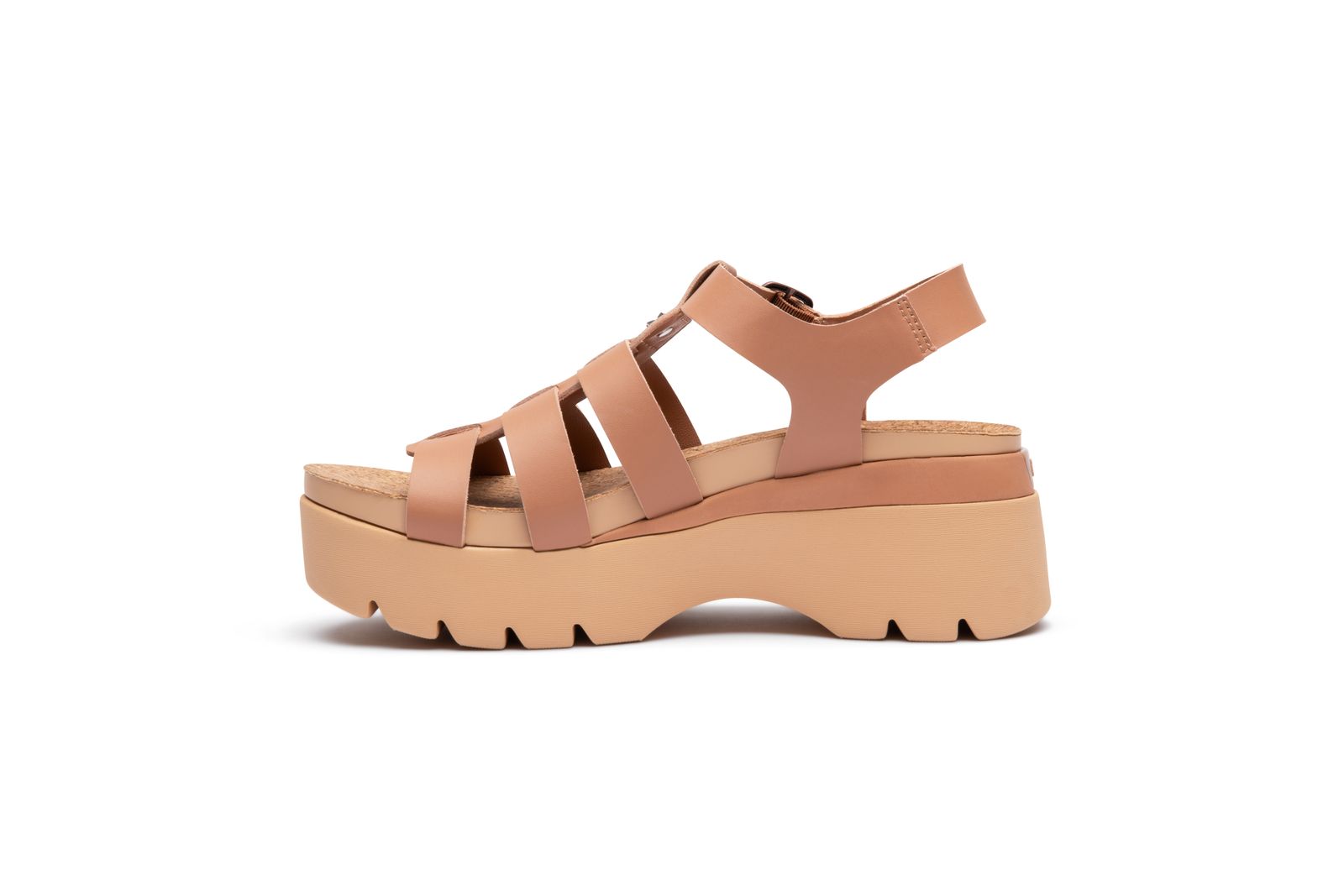 a women's sandal with straps and a platform