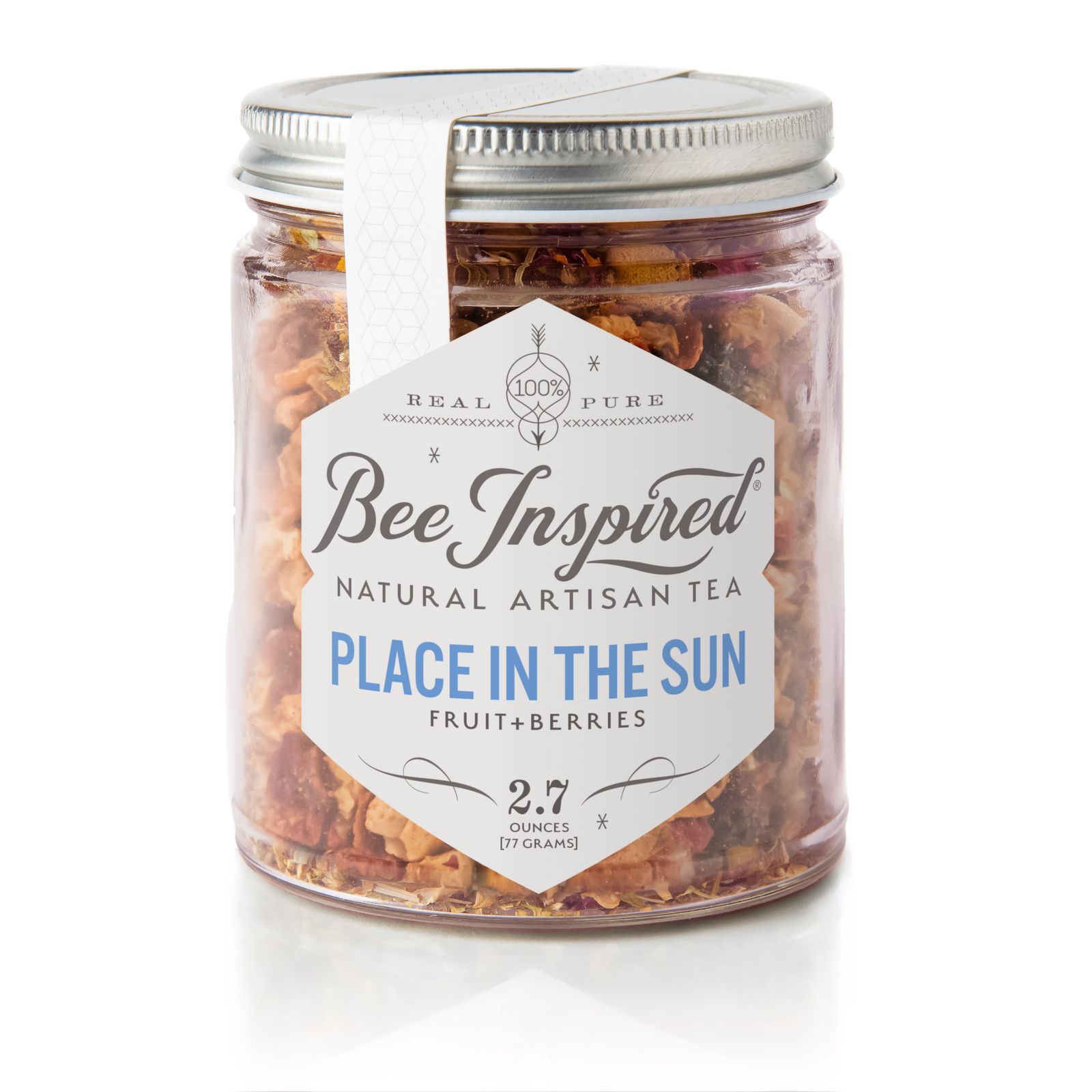 a jar filled with nuts sitting on top of a table