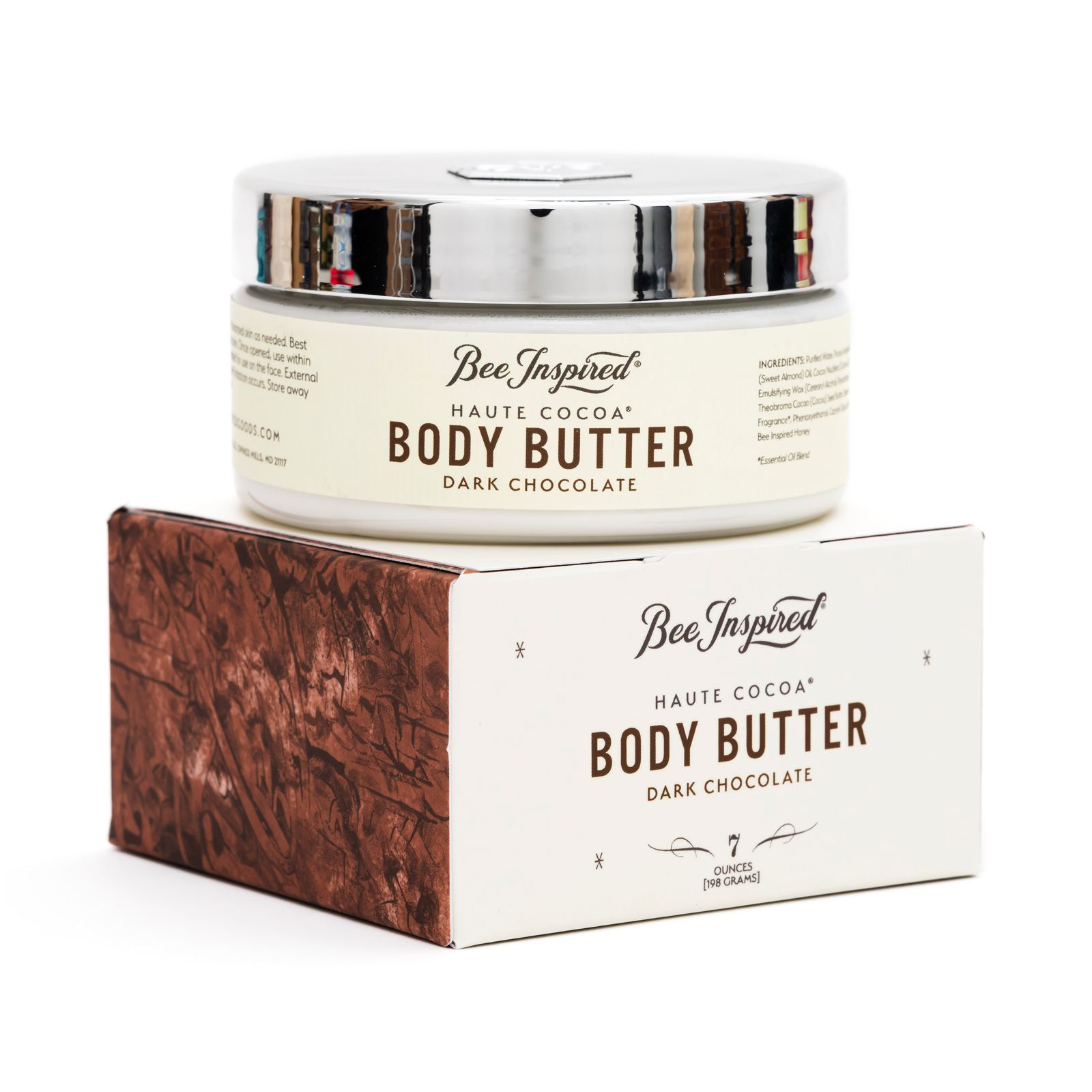 a box of body butter next to a box of chocolate