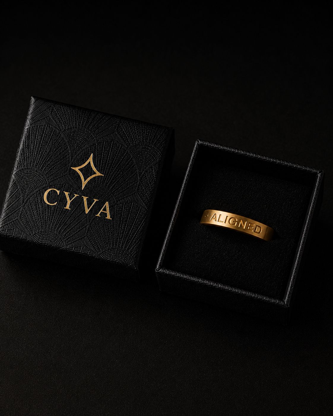 a black box with a gold logo on it