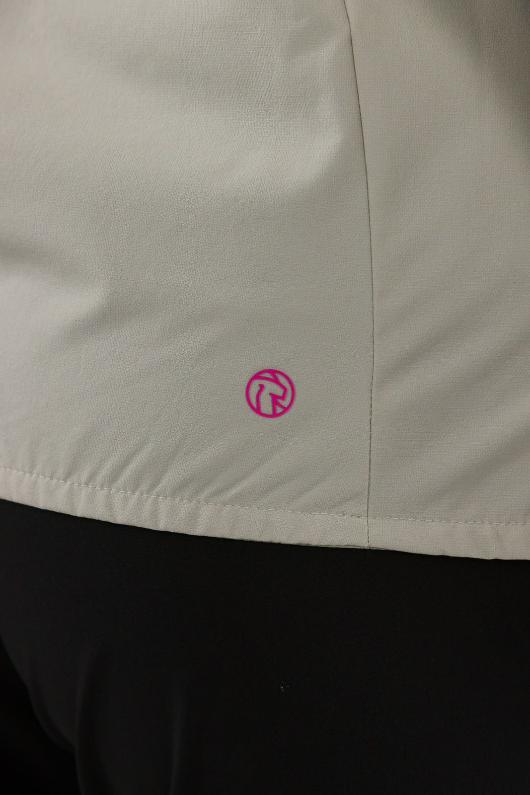 a close up of a person wearing a white jacket