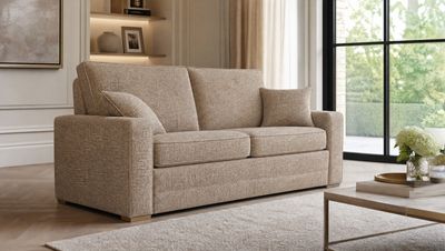 a living room with a couch and a table