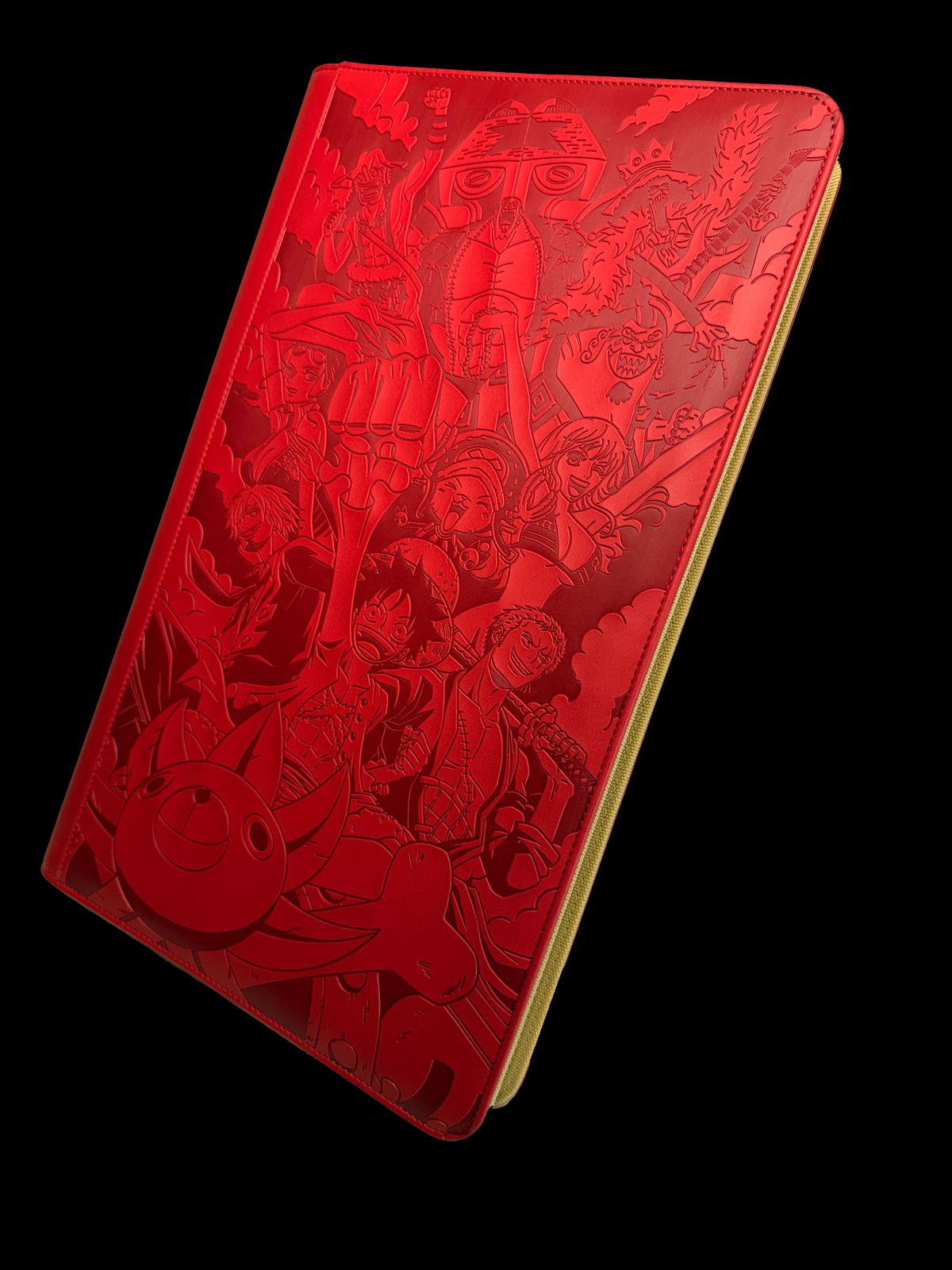 a red notebook with a bunch of cartoon characters on it