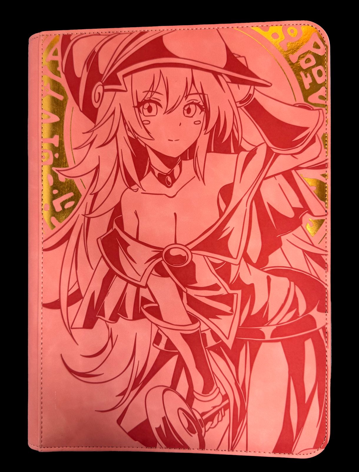 a pink notebook with a drawing of a girl in a hat