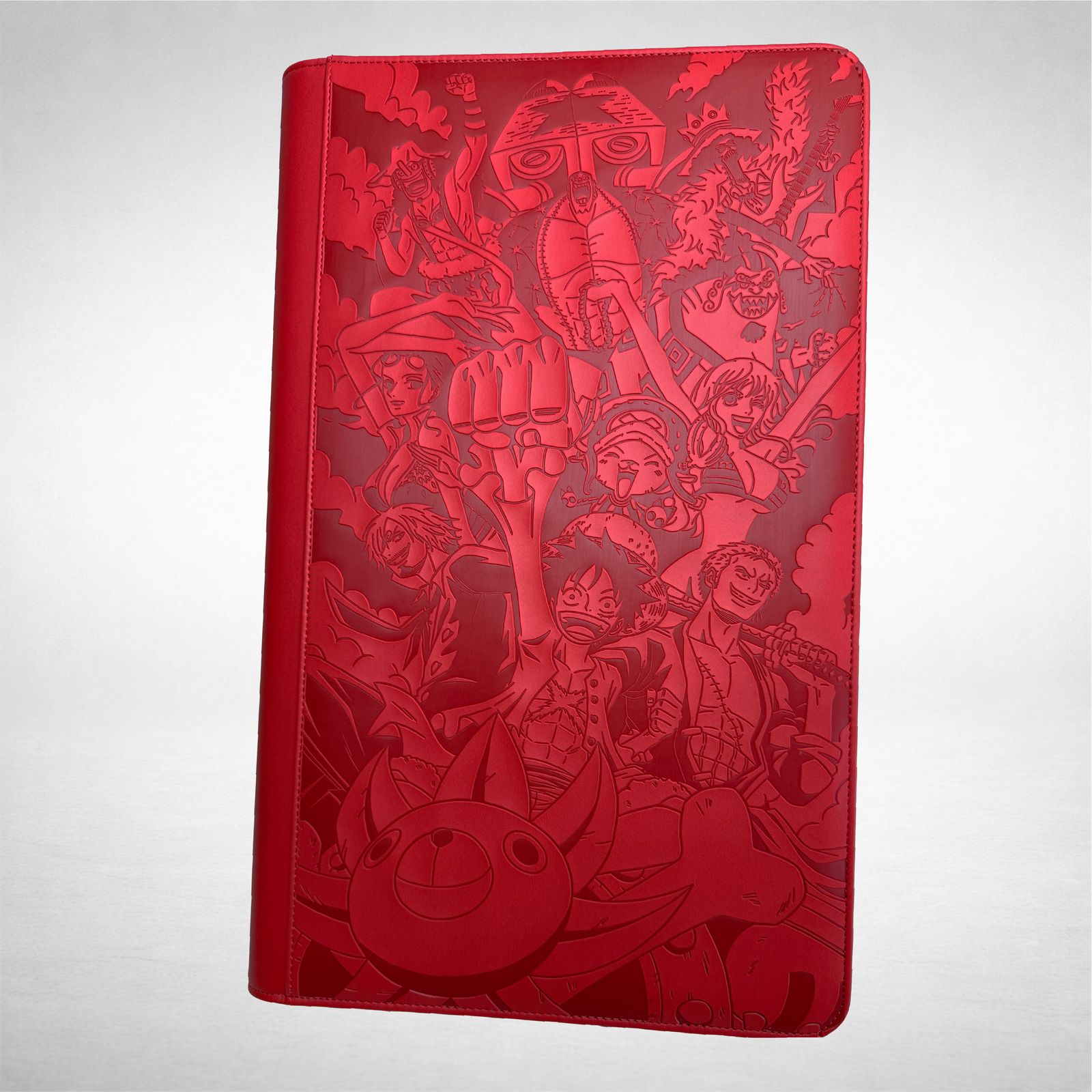 a red notebook with a bunch of cartoon characters on it