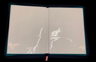 an open book with a picture of a bird on it