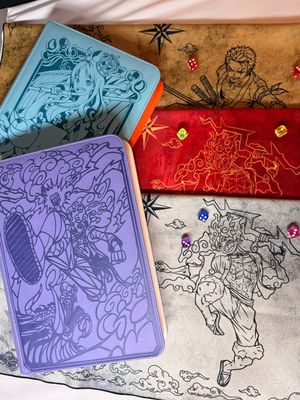 a couple of books sitting on top of a bed