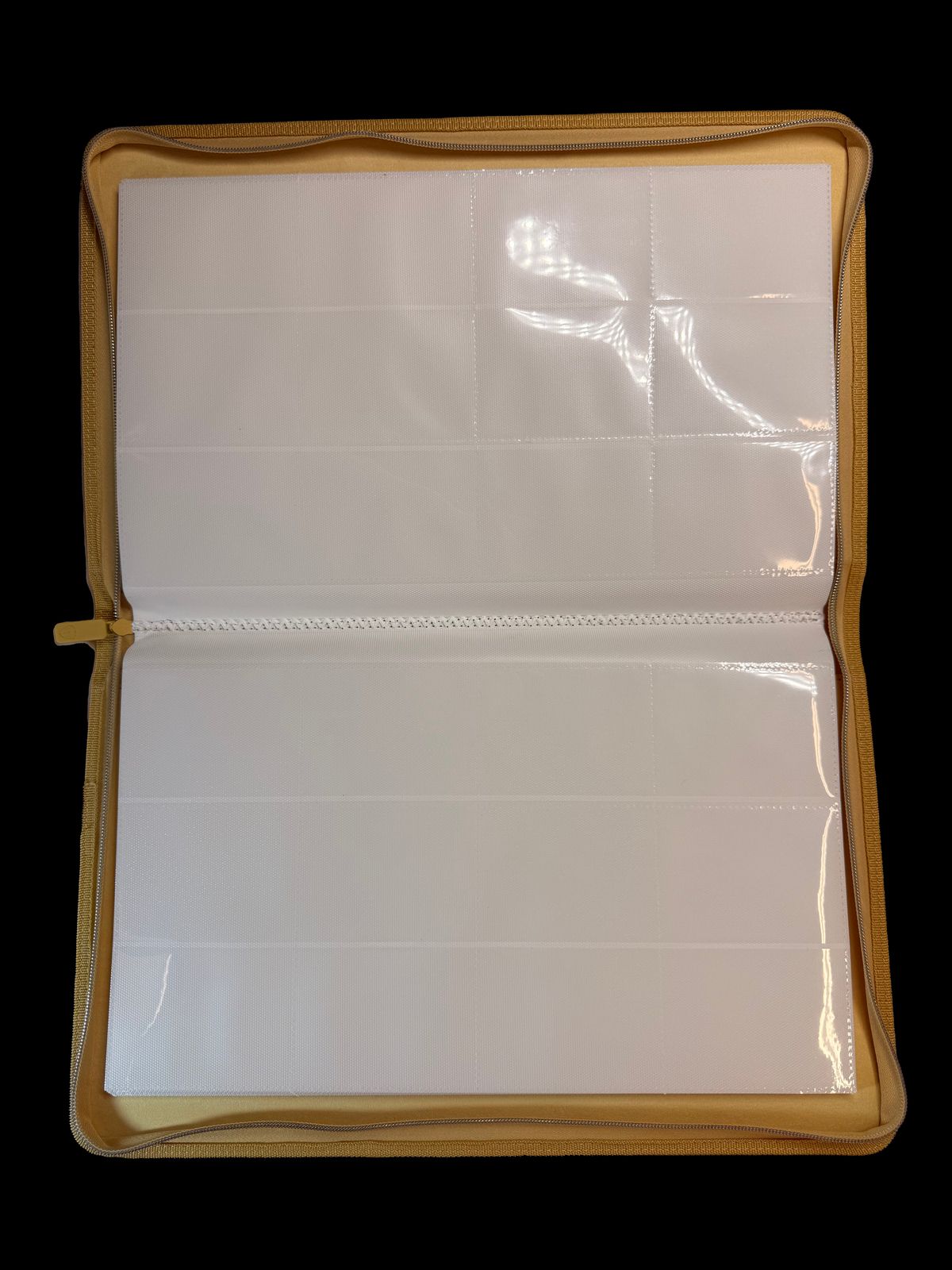 a close up of a piece of white paper on a black background