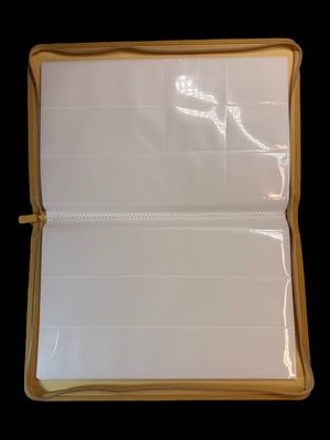 a close up of a piece of white paper on a black background