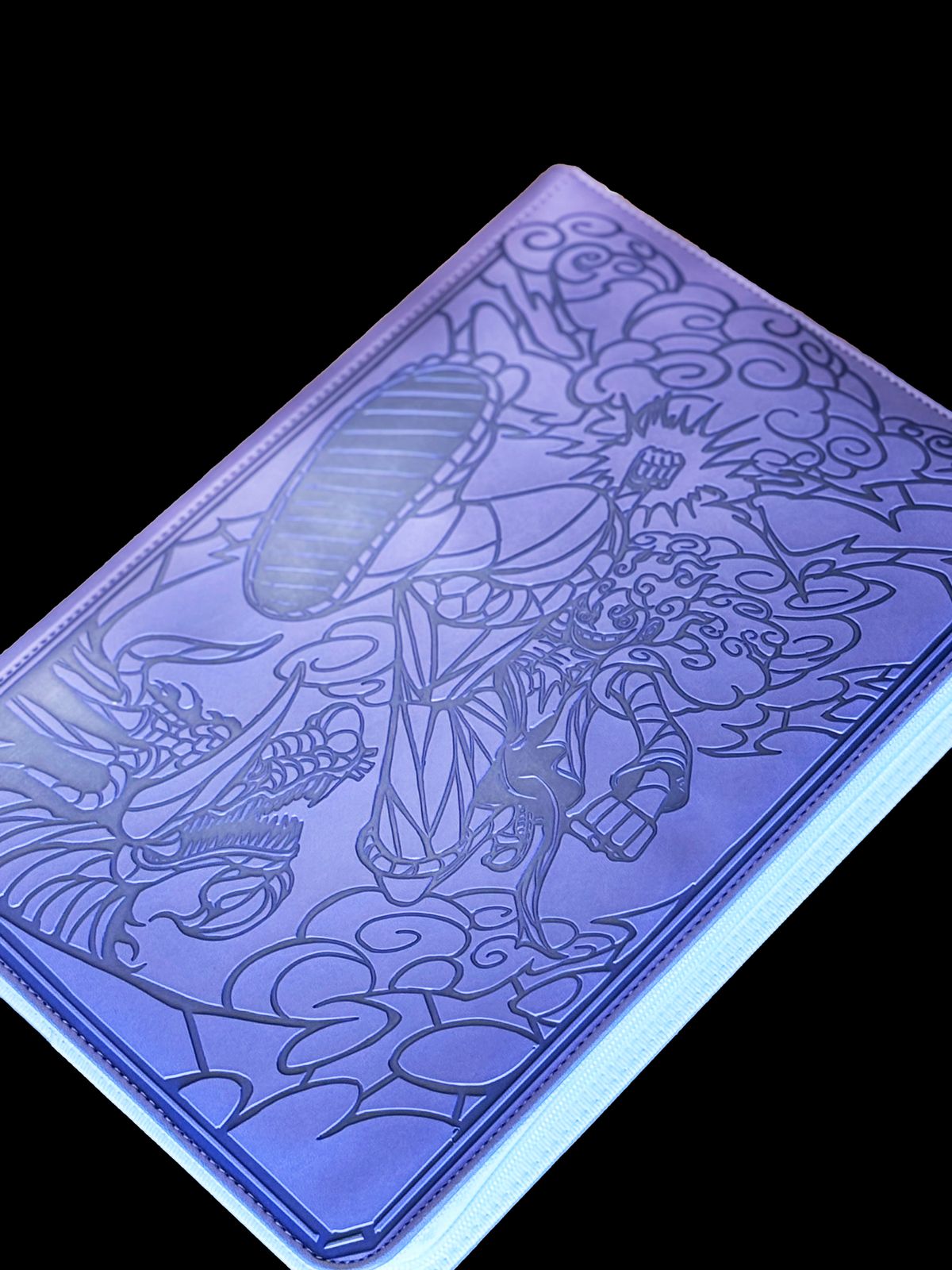 a blue notebook with a picture of a bird on it