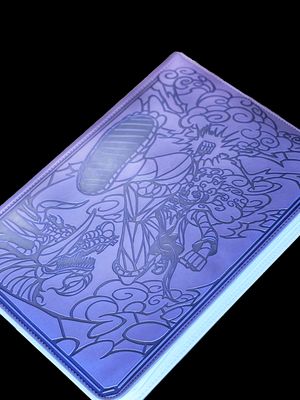 a blue notebook with a picture of a bird on it