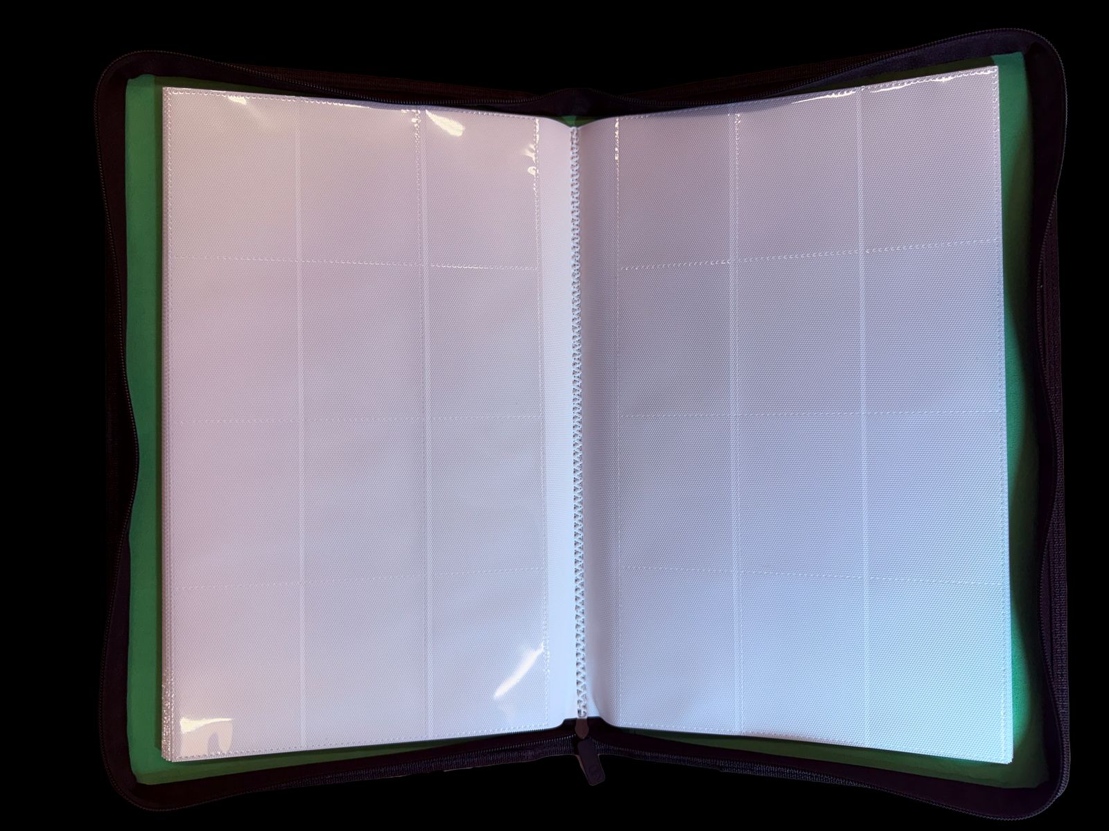 an open notebook with a white sheet of paper on top of it