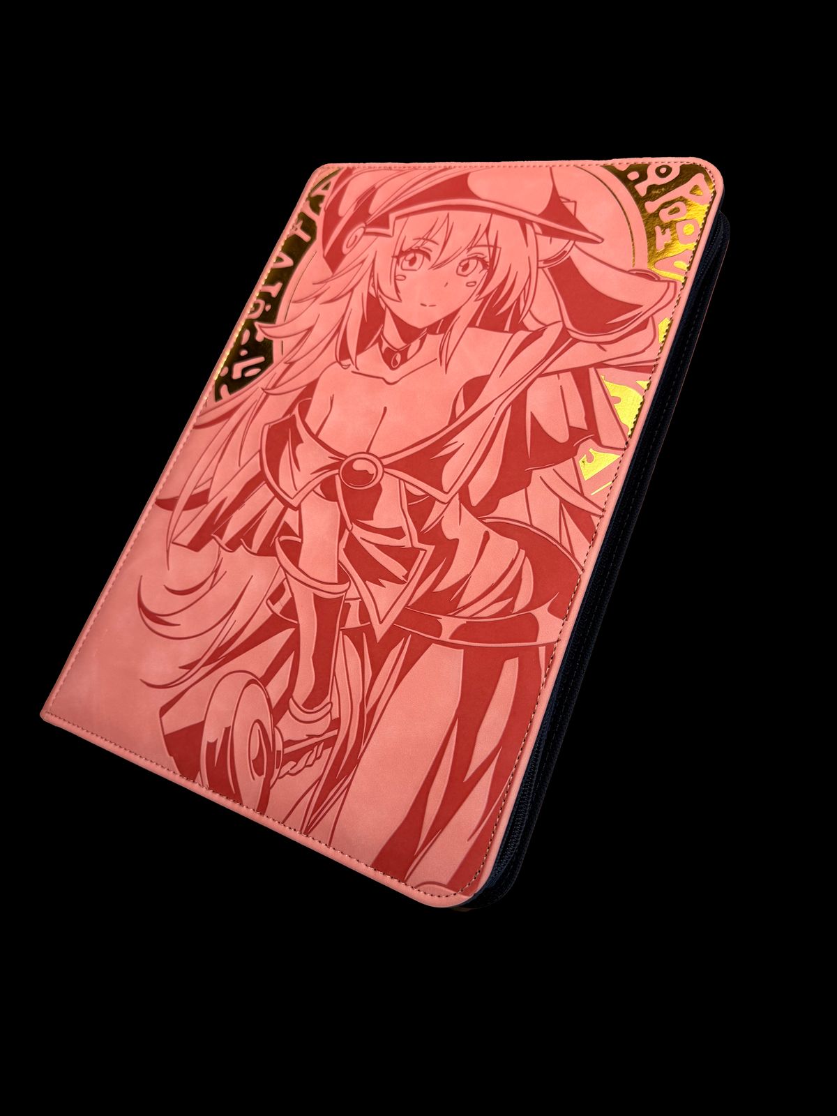 a pink notebook with a picture of a girl on it