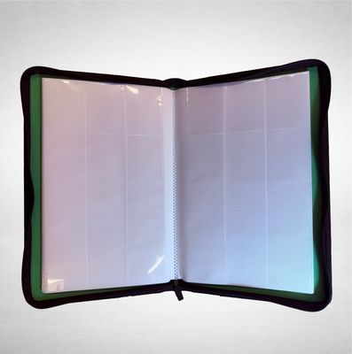 an open notebook on a table with a white background