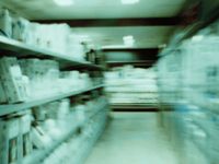 a blurry photo of shelves in a store