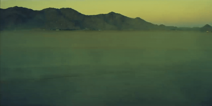 a view of a mountain range in the distance