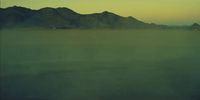 a view of a mountain range in the distance