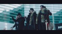 a group of men standing next to each other