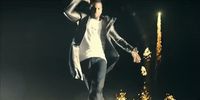 a man in a white shirt and a black jacket