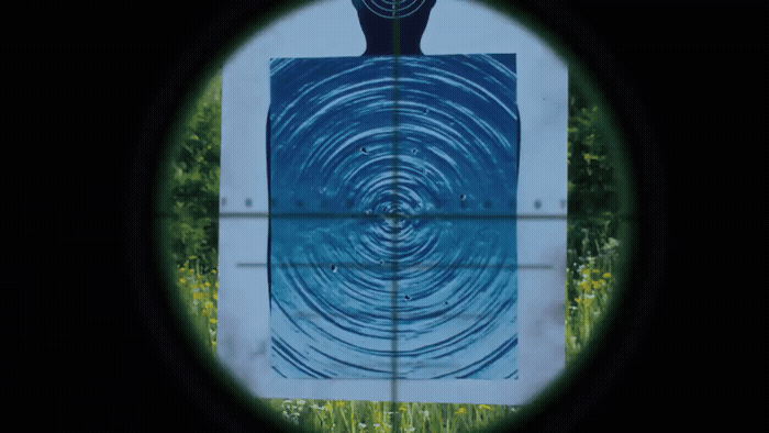 a view through a scope of a painting