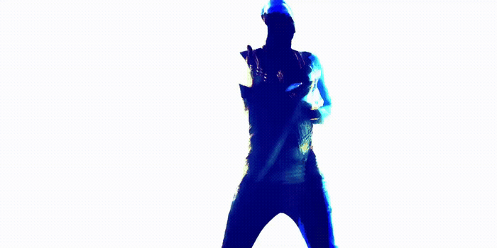 a silhouette of a man holding a cell phone
