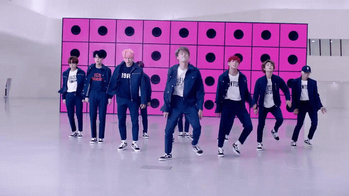 a group of young men standing next to each other