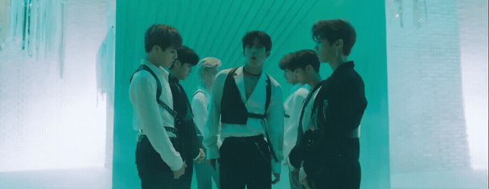a group of young men standing next to each other