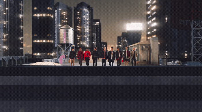 a group of people standing on top of a roof
