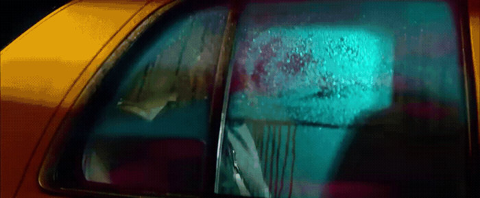 a car that has a green light on the side of it
