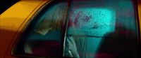 a car that has a green light on the side of it