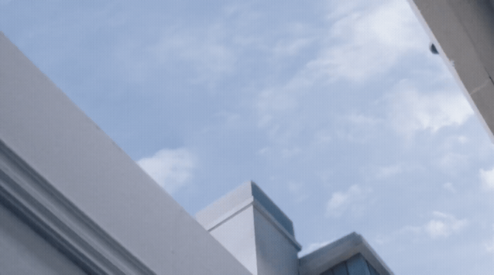 a building with a clock on the side of it