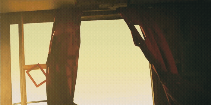a window with a view of the ocean