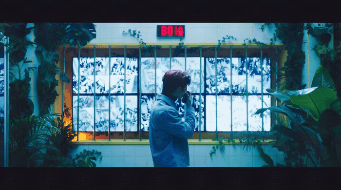 a person standing in front of a window