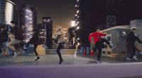 a group of people jumping in the air