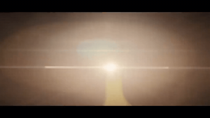 a blurry photo of the sun shining in the sky