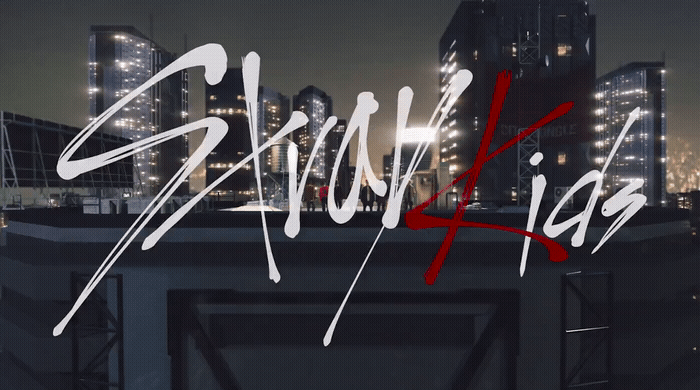 a picture of a city at night with the words slinkling