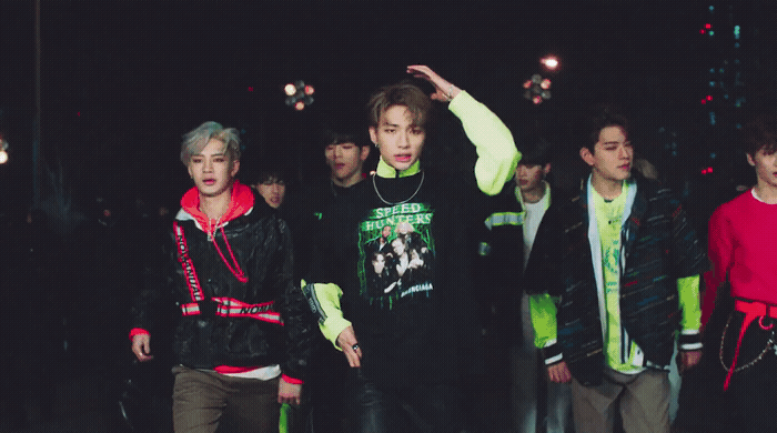 a group of young men standing next to each other