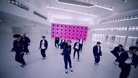 a group of people standing in a room