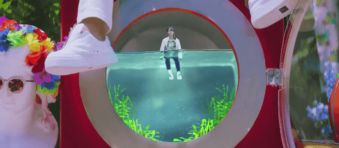 a person standing in front of a toilet