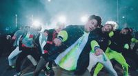 a group of young men dancing on a stage