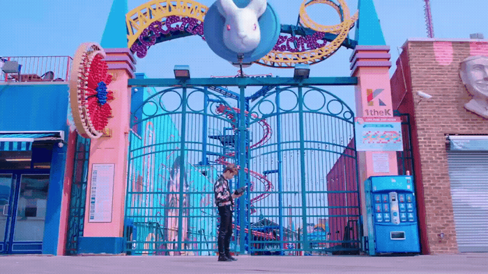 a person standing in front of a gate